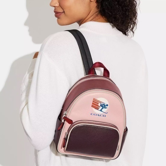 Coach Handbags - Coach • Mini Court Backpack In Colorblock Ski Speed Graphic Powder Pink Multi
